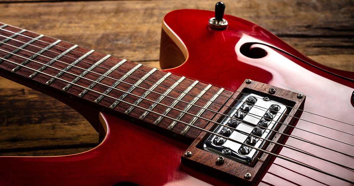 detail of red electric guitar
