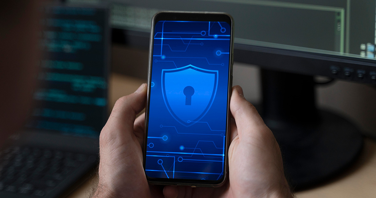 Device security: cell phone with shield and lock image displayed